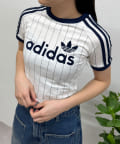 CIAOPANIC(チャオパニック) 【adidas/アディダス】リニア グラフィック カリ半袖Tシャツ