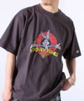 FREDY & GLOSTER(フレディ アンド グロスター) 【WARNER×DISCUS ATHLETIC】コラボ プリント 半袖Tシャツ