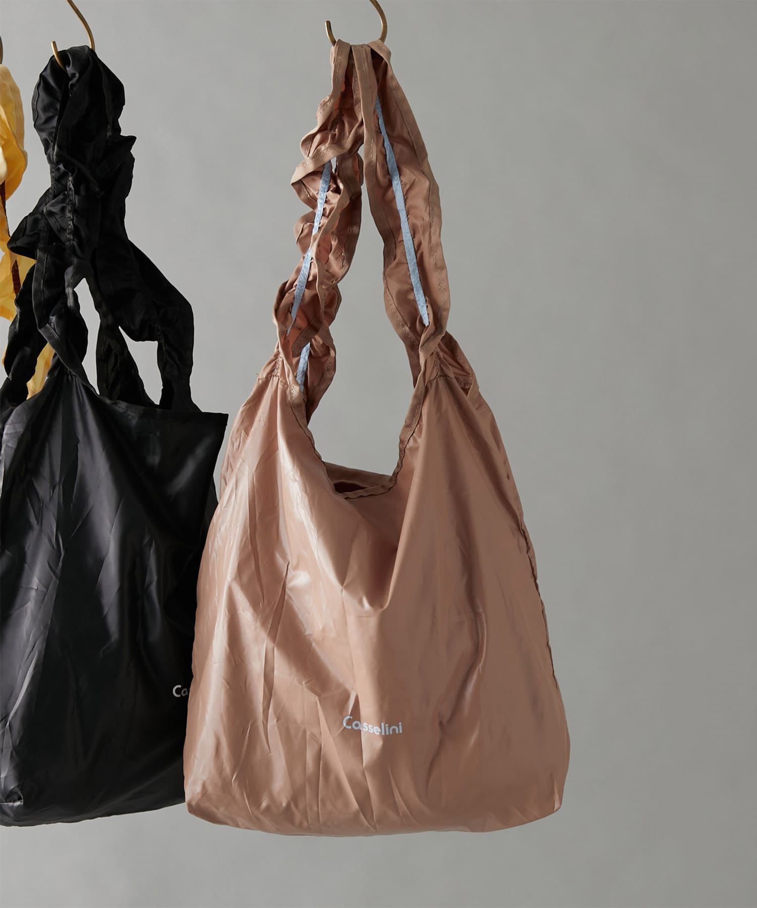 un dix cors(アンディコール) 【コンパクトに持ち運べる】フリルエコバッグ