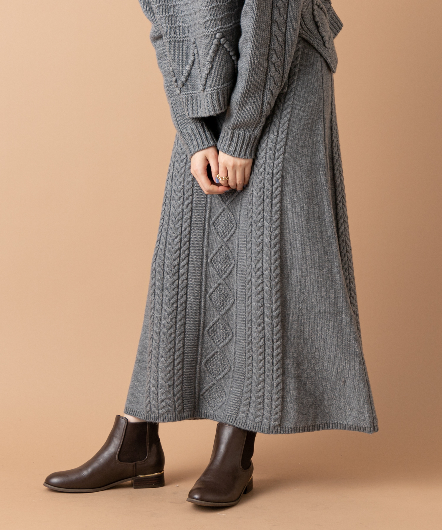 un dix cors(アンディコール) 【フレアのシルエットが女性らしく華やかに】ケーブルマキシスカート