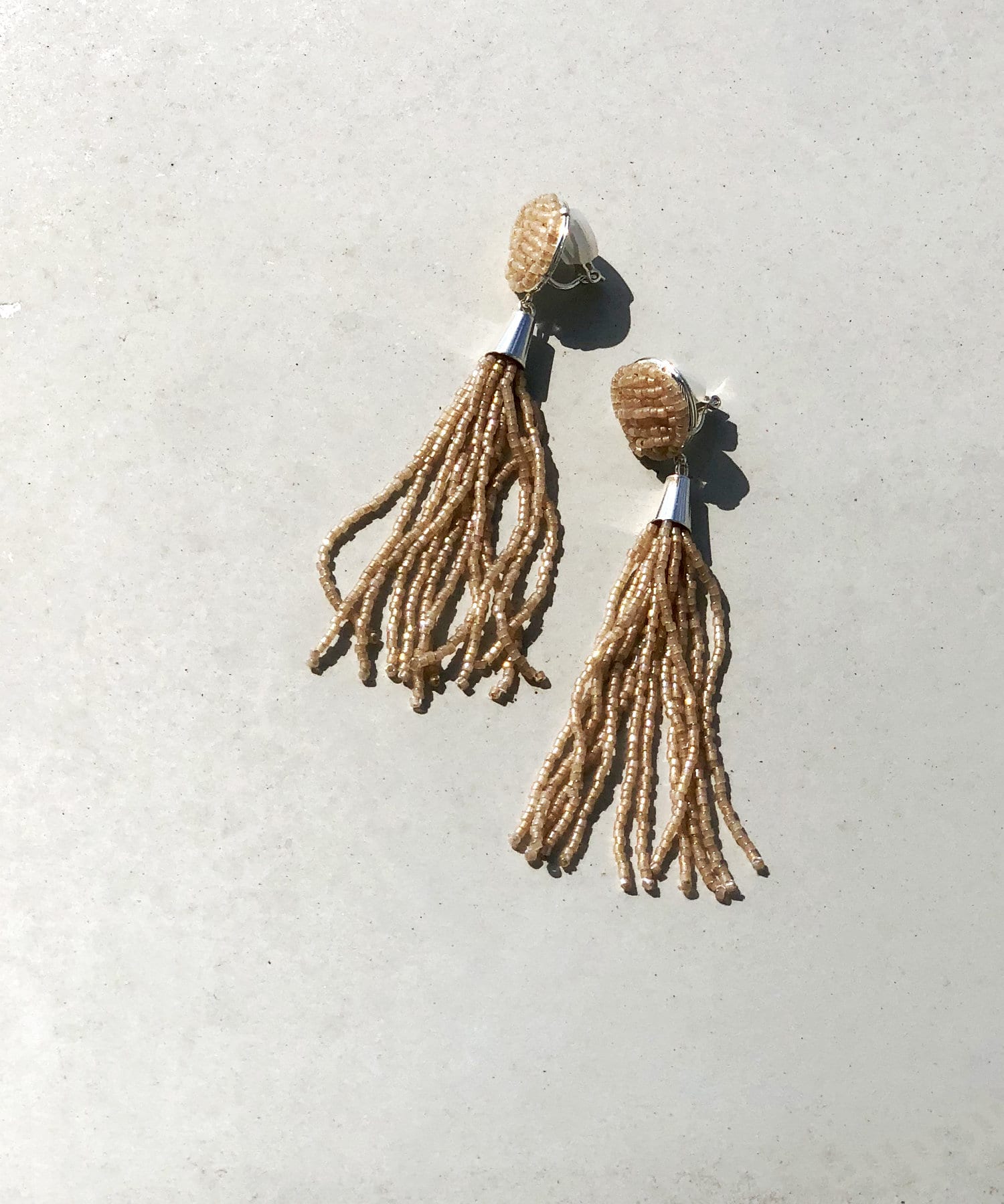 un dix cors(アンディコール) 【エスニック風なスパイスがポイント】ビーズフリンジイヤリング