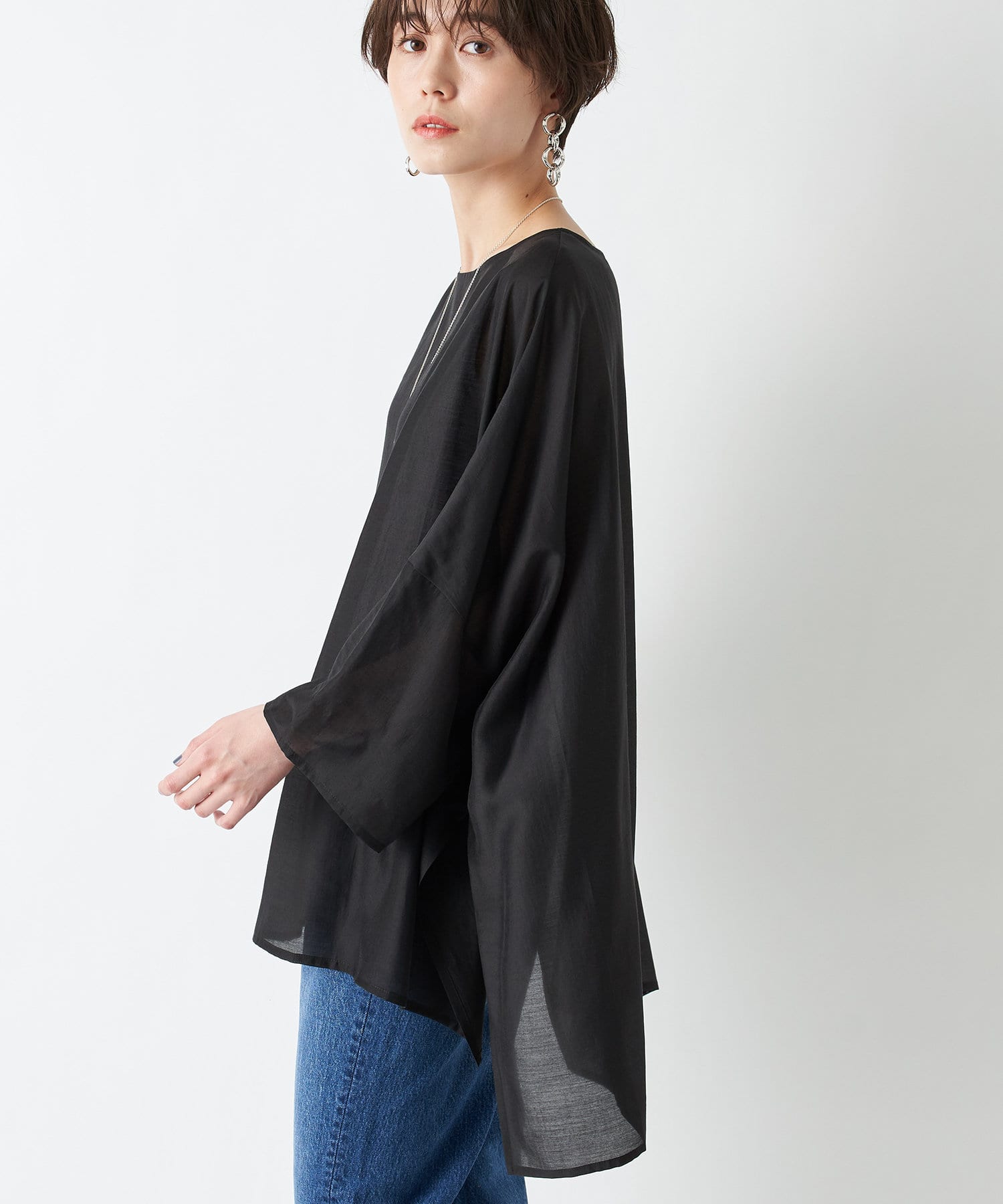 un dix cors(アンディコール) 【今季旬のシルエット】シアーポンチョブラウス