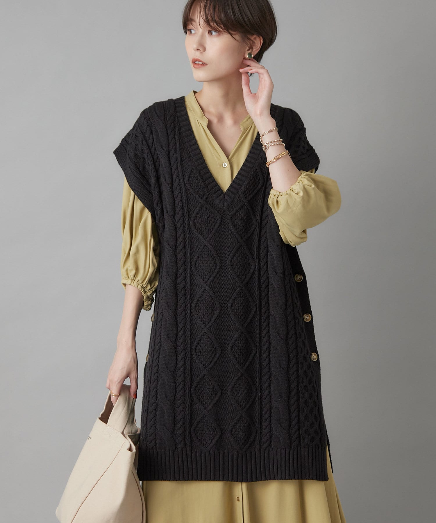 un dix cors(アンディコール) 【旬のレイヤードスタイルが完成】ケーブルロングベスト