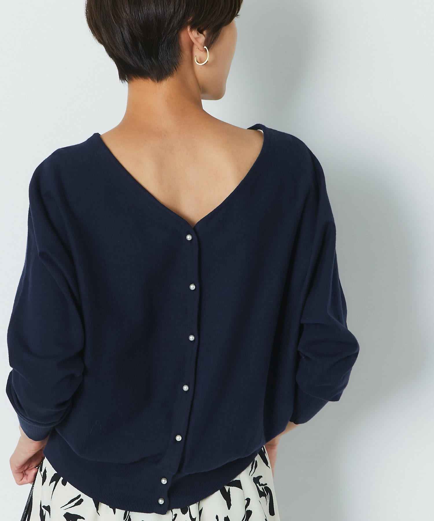 un dix cors(アンディコール) 【春先まで使える】2wayパール釦カーディガン