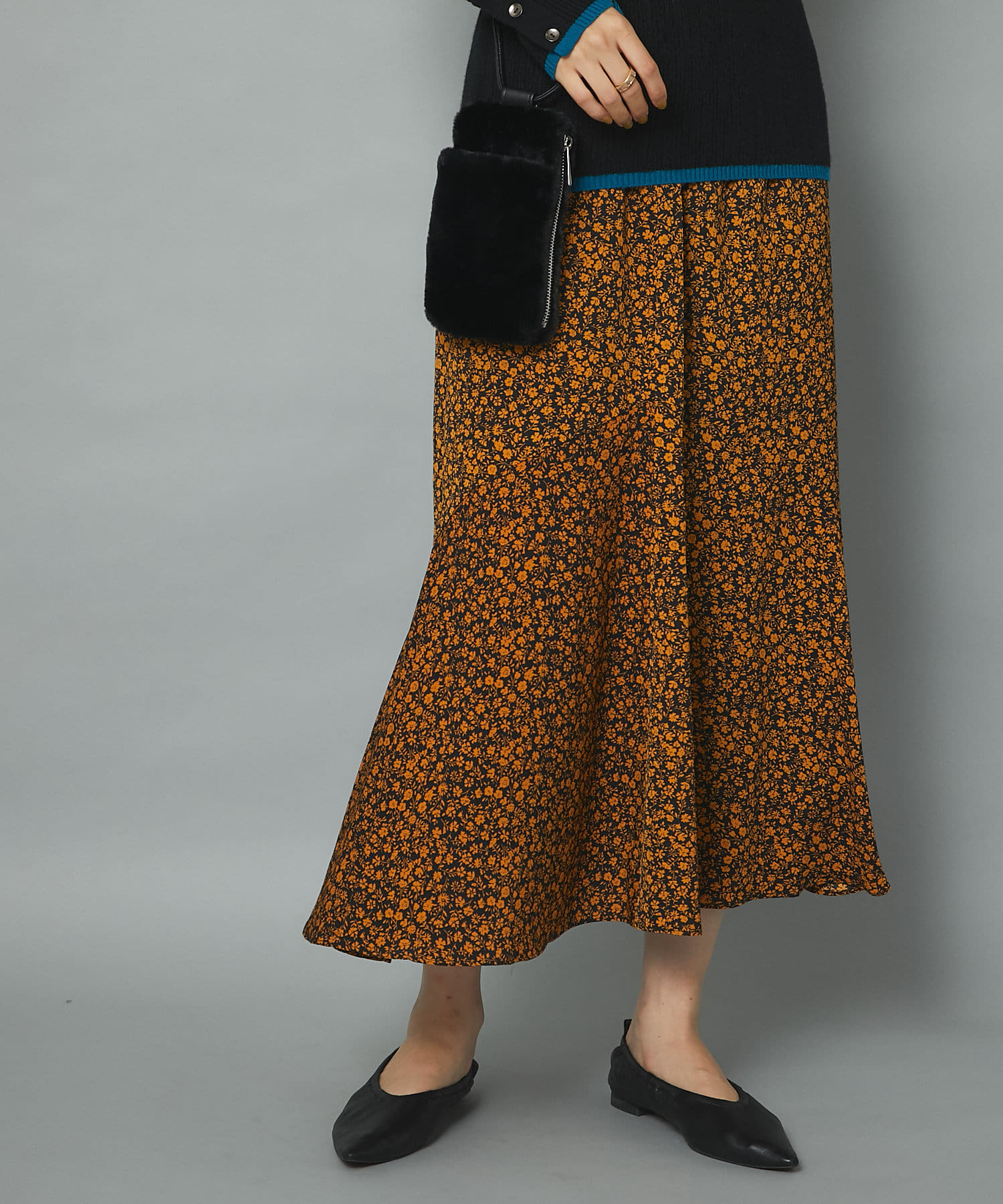 un dix cors(アンディコール) 【歩くたび上品に揺れる】小花プリントアシメ切替スカート