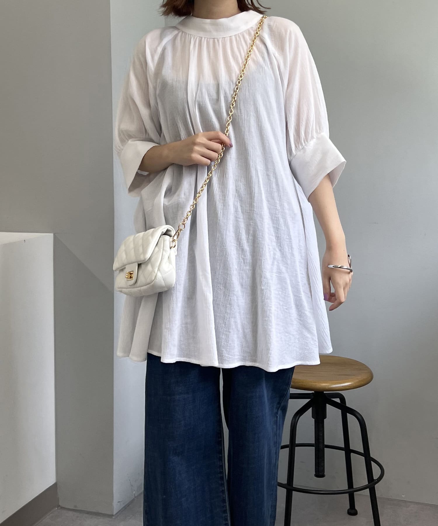 un dix cors(アンディコール) 【ふわっと広がる】ハイネックラグランチュニックブラウス