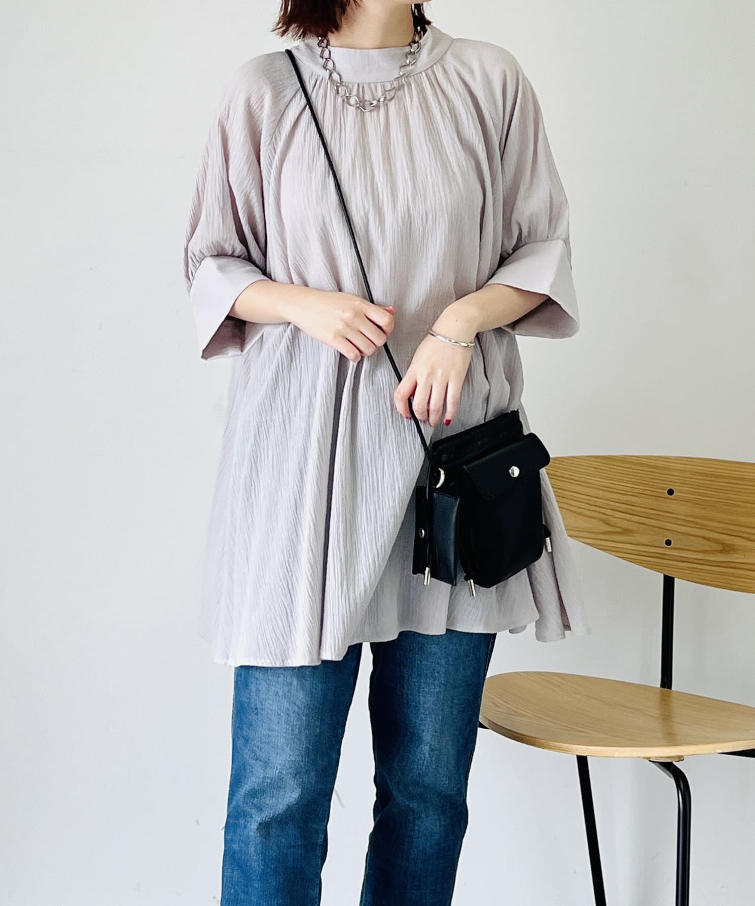 un dix cors(アンディコール) 【ふわっと広がる】ハイネックラグランチュニックブラウス