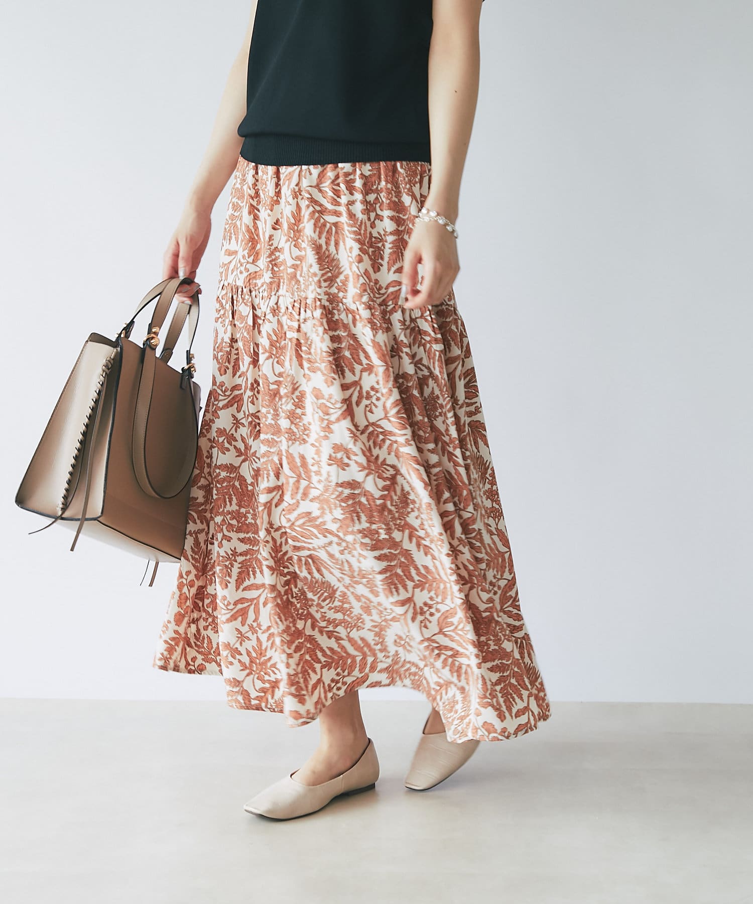 un dix cors(アンディコール) 【リゾートムードが高まる】リーフ柄２段ティアードスカート