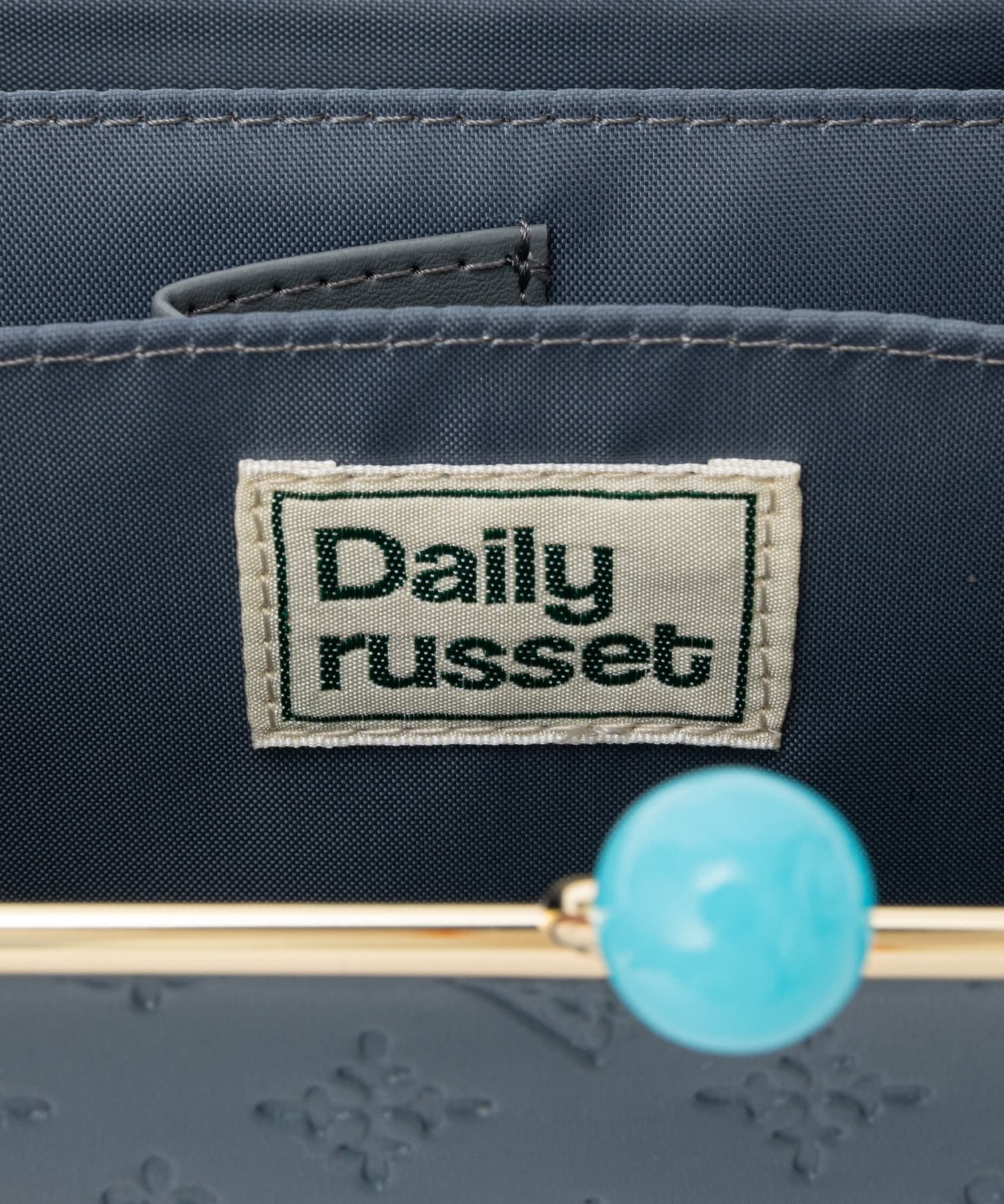 Daily russet(デイリー ラシット) 【2023 SS新色】フェイクレザー エンボスガマグチ財布（L）
