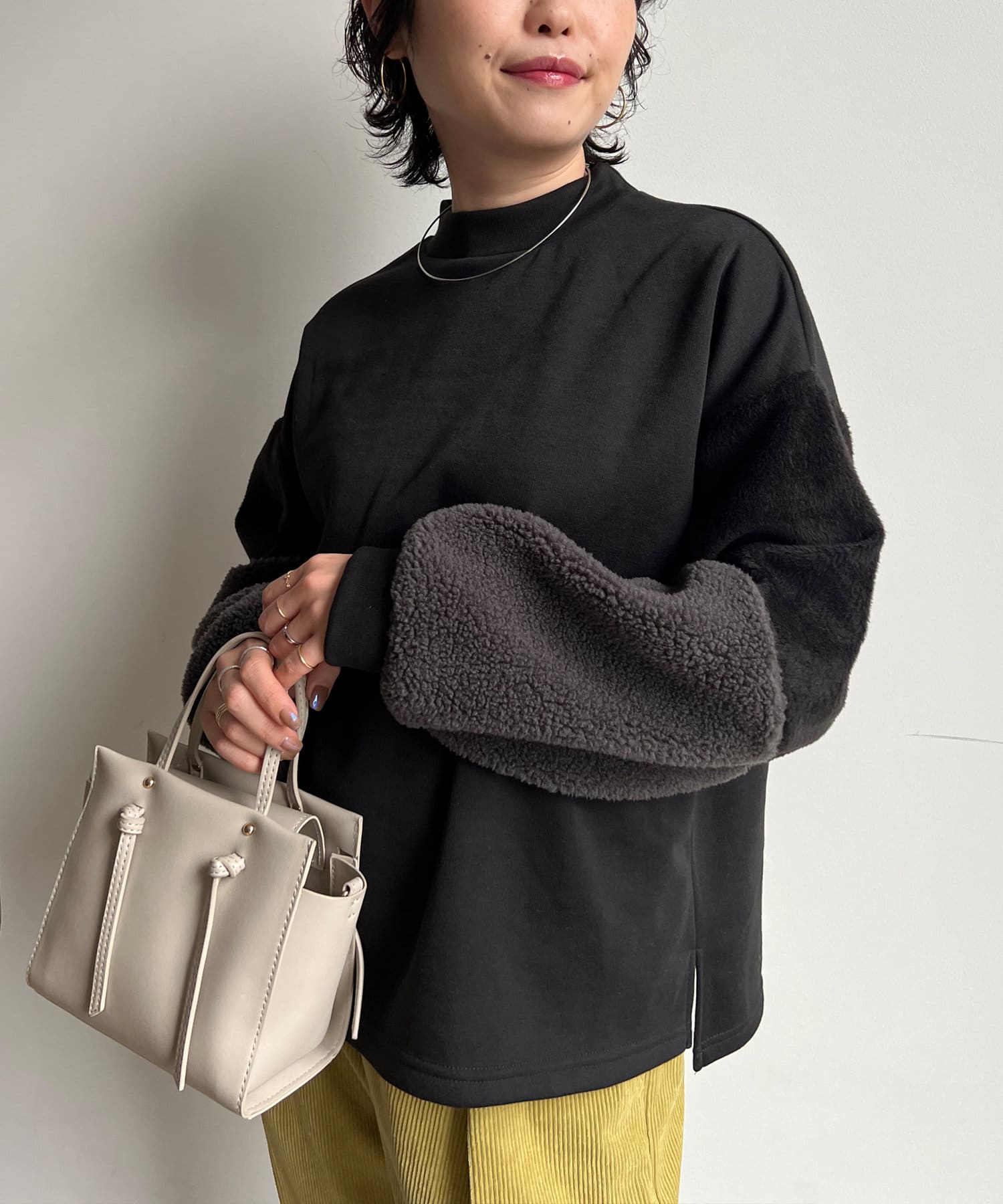 Chez toi(シェトワ) 袖ファーボア切替ボトルネックプルオーバー