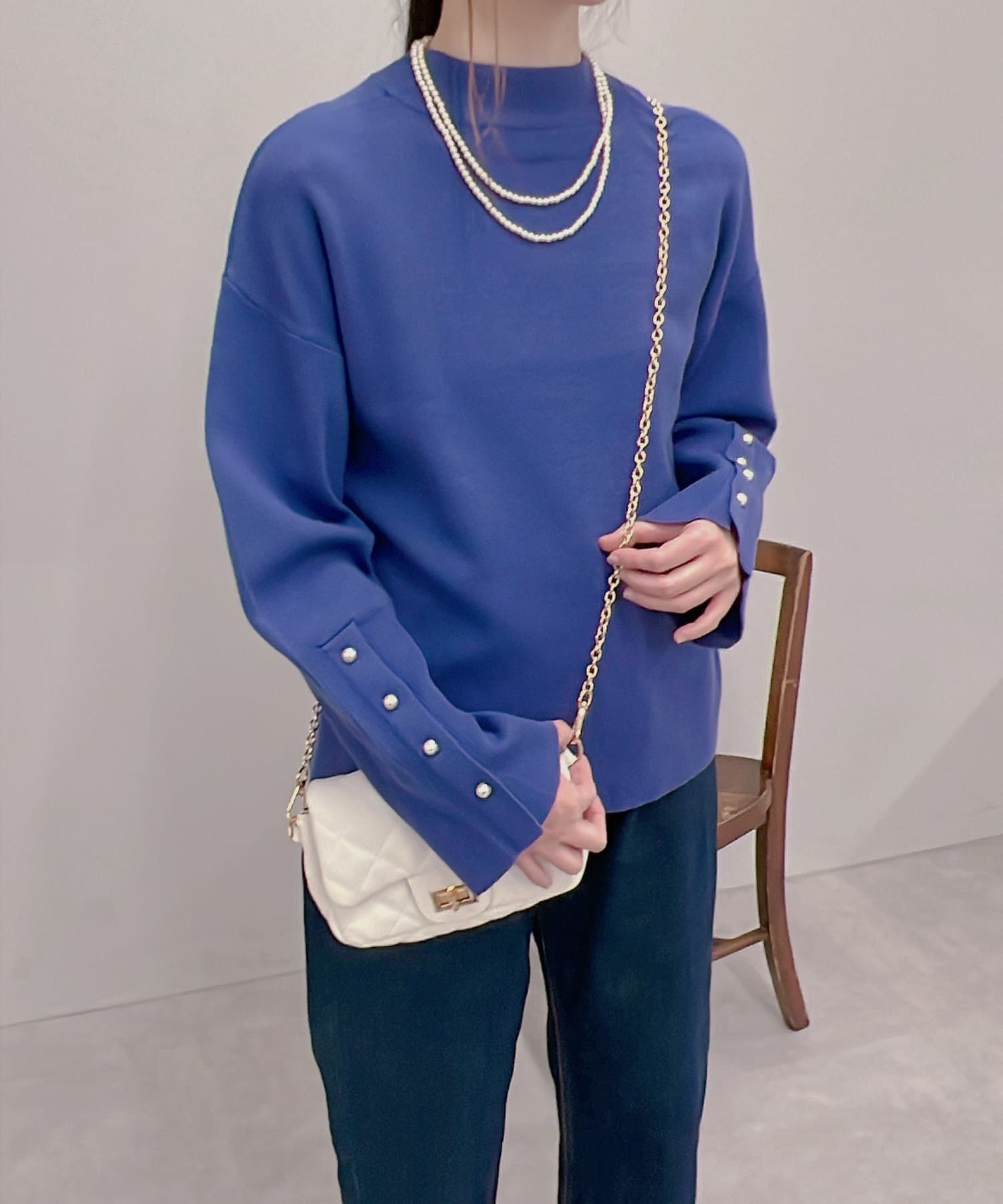 un dix cors(アンディコール) 【ベーシックに着回せる】袖スリットパール釦ニット