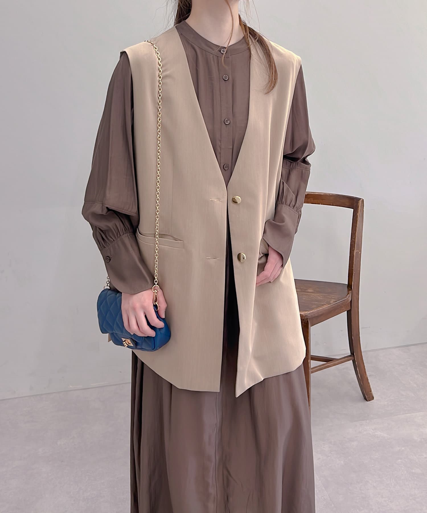 un dix cors(アンディコール) 金ボタンバックベルトベスト