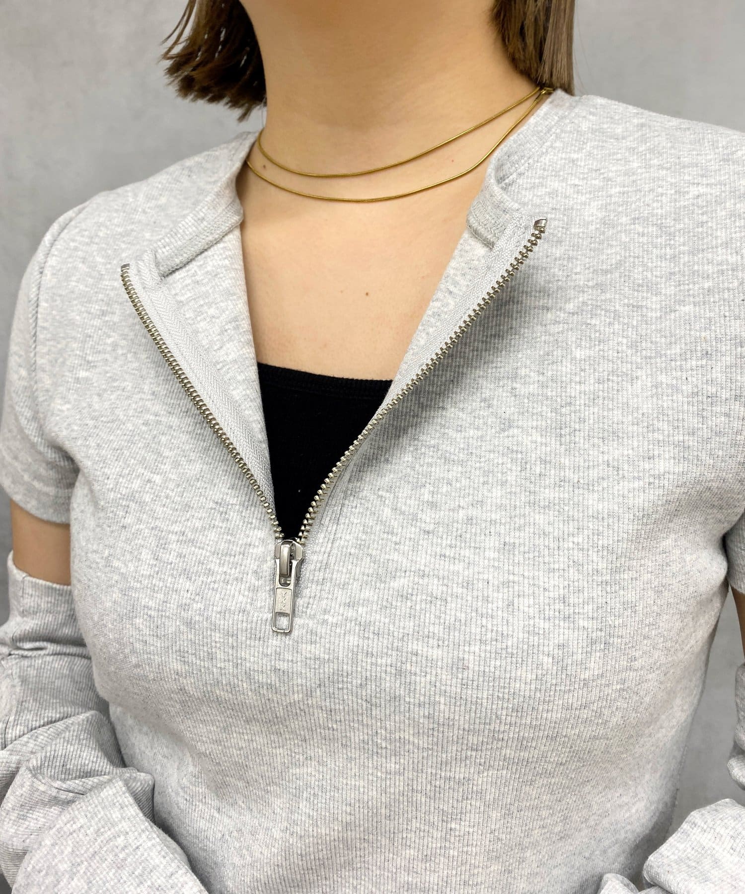 WHO’S WHO gallery(フーズフーギャラリー) ハーフジップアームウォーマートップス