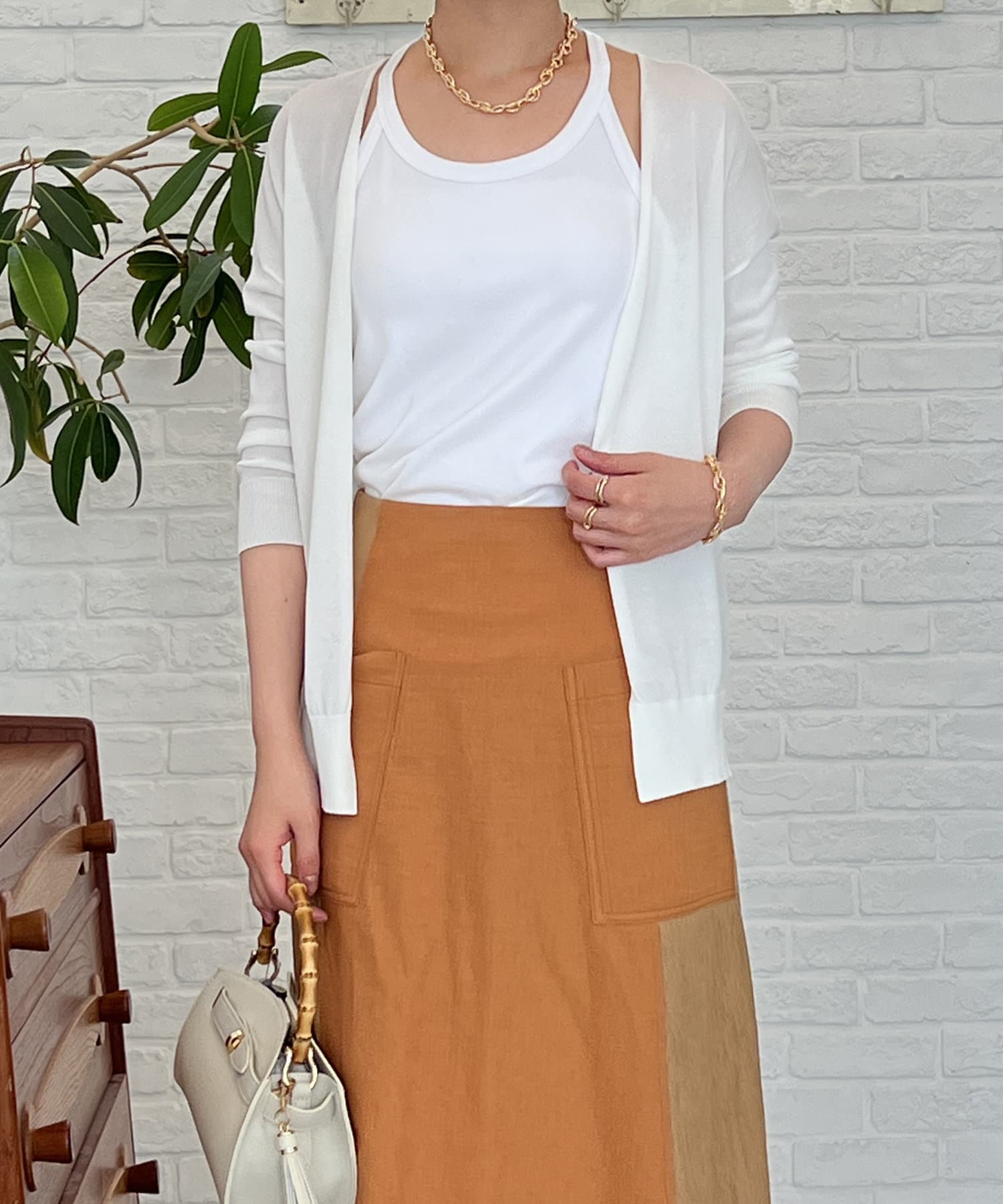 un dix cors(アンディコール) UV加工トッパーカーディガン