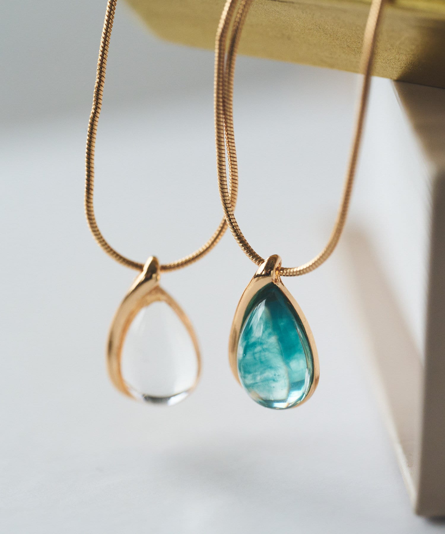 un dix cors(アンディコール) GOLDY/クリアトップネックレス