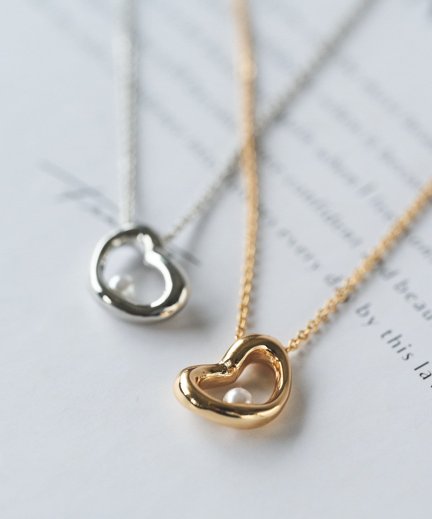 un dix cors(アンディコール) GOLDY/パールインハートトップネックレス