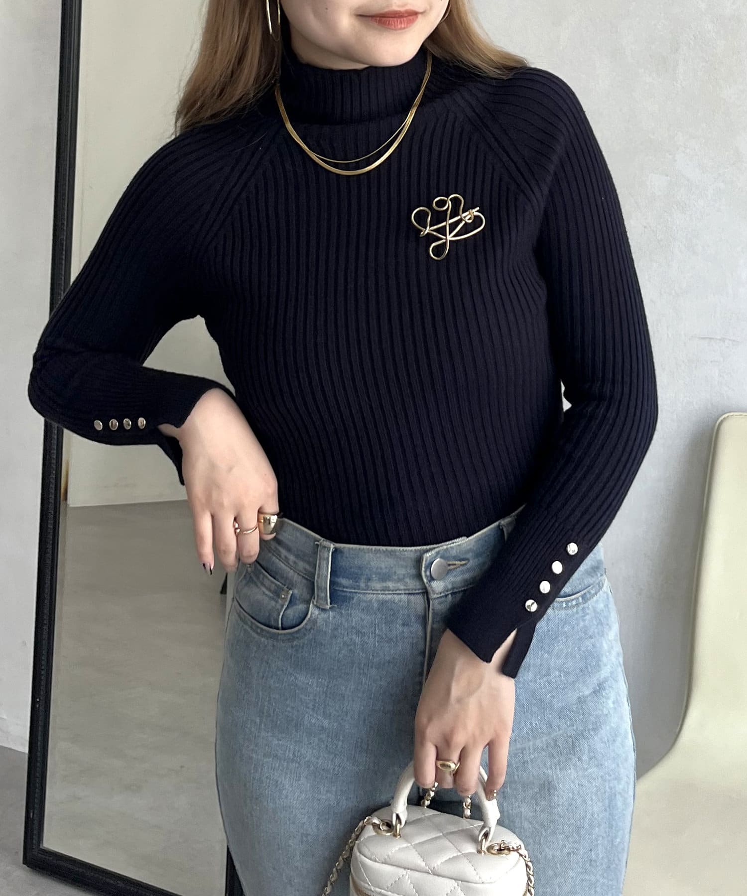 prose verse(プロズヴェール) 袖ボタンハイネックリブニット