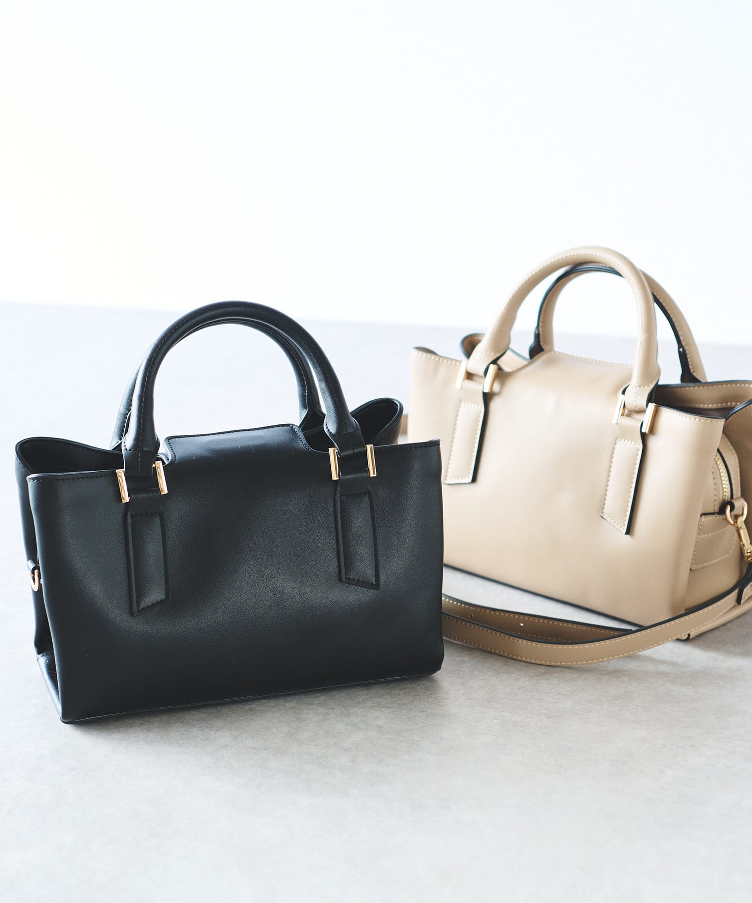 un dix cors(アンディコール) マグネット開閉ハンドバッグ