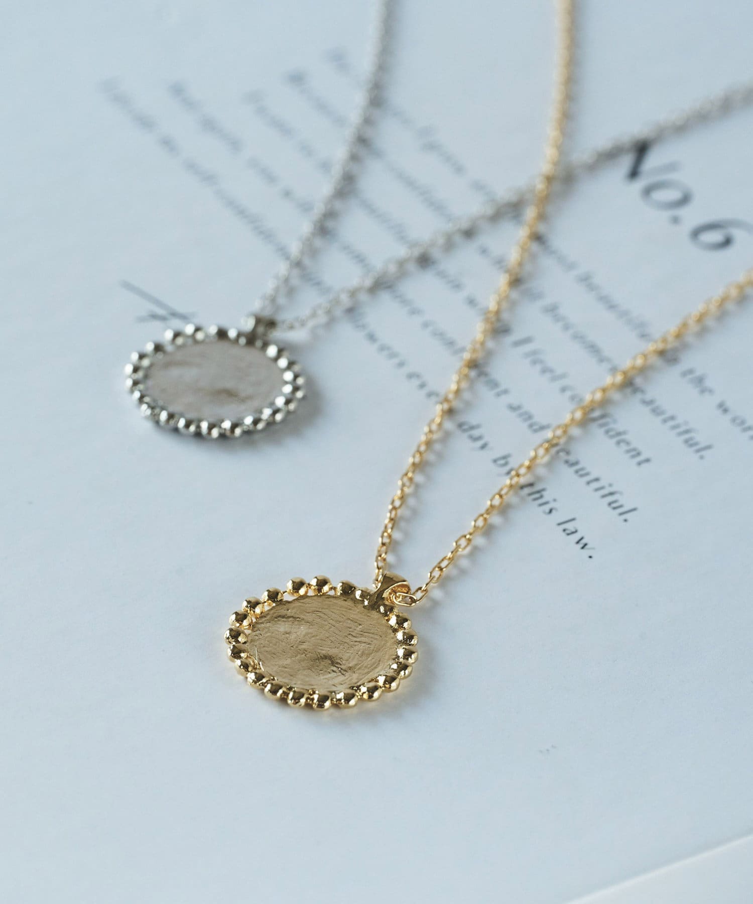 un dix cors(アンディコール) コイン風ワントップネックレス