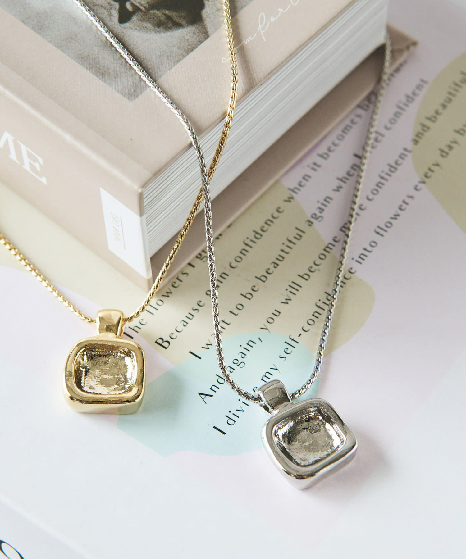 un dix cors(アンディコール) スクエアトップスライドネックレス