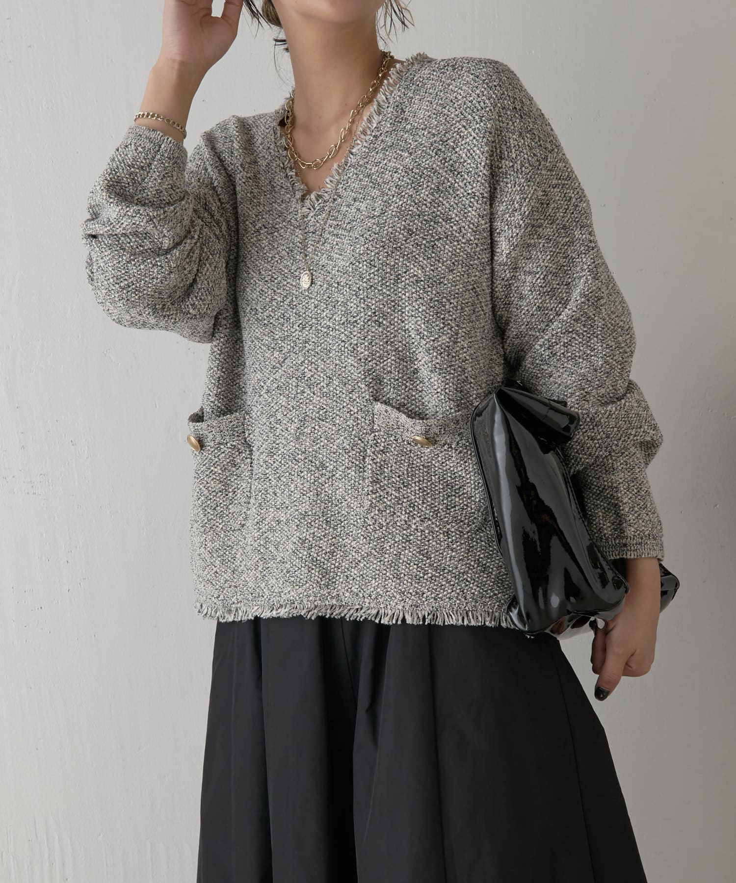 Jena　espace merveilleux(ジェナ　エスパスメルヴェイユ) フリンジポケットニット
