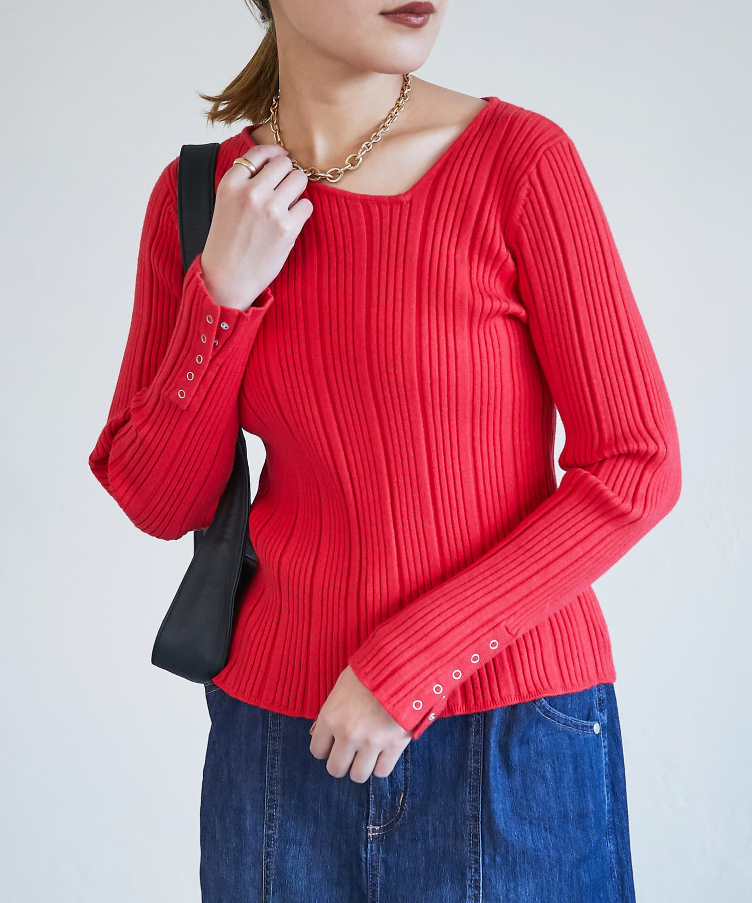 un dix cors(アンディコール) アシメVネック袖釦ニット