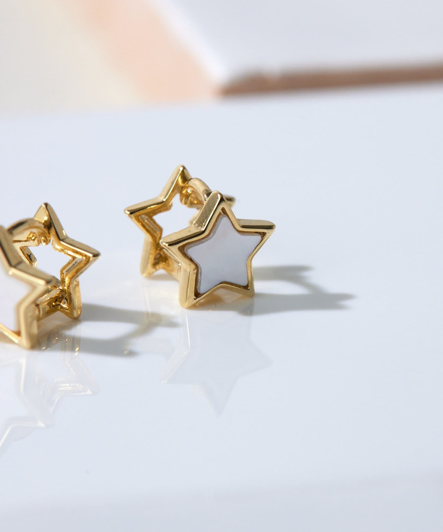 シェル使用》星/ミニホワイトスターピアス | ear PAPILLONNER