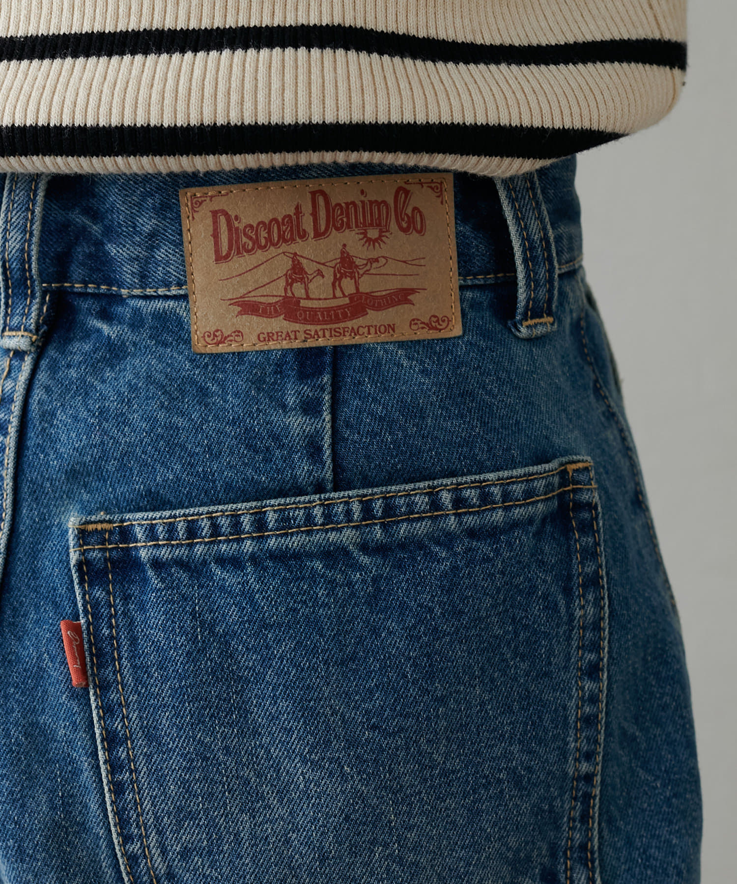 DISCOAT(ディスコート) ビンテージ加工デニムカーブパンツ