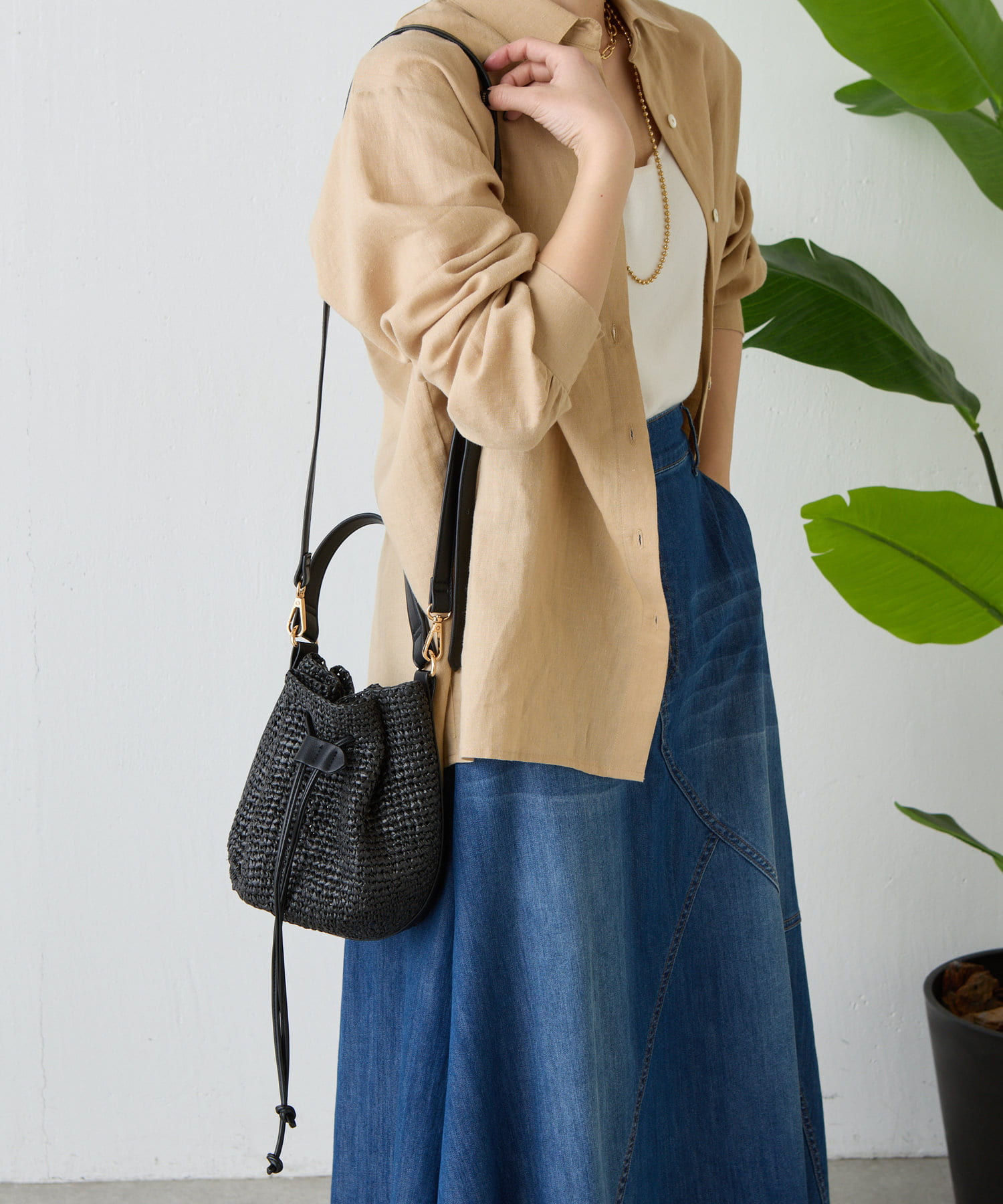 Jena　espace merveilleux(ジェナ　エスパスメルヴェイユ) ラフィア巾着バッグ