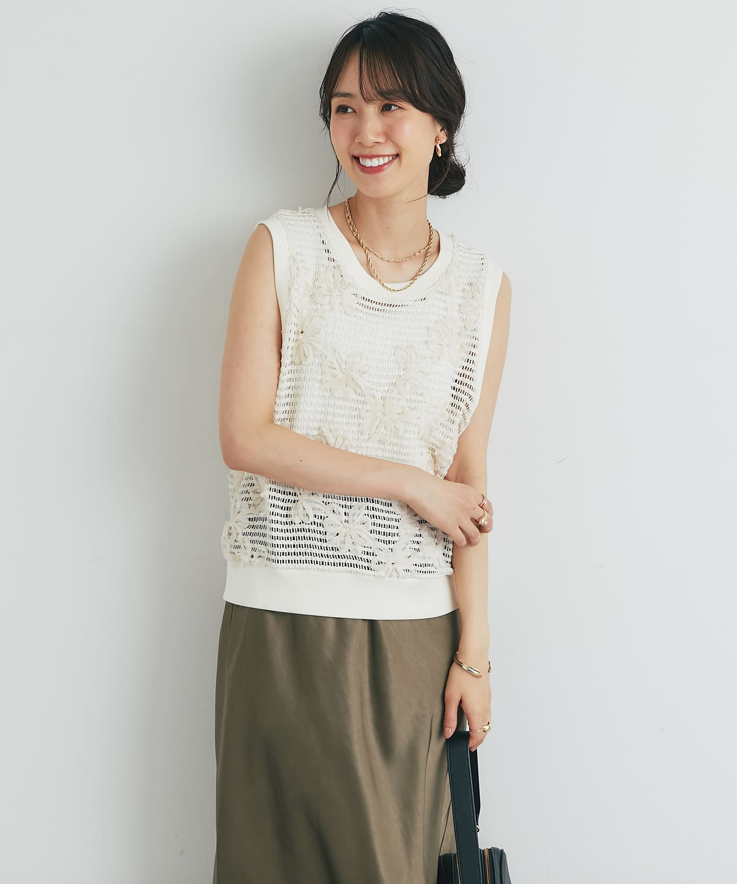 フラワーモチーフメッシュトップス | un dix cors(アンディ