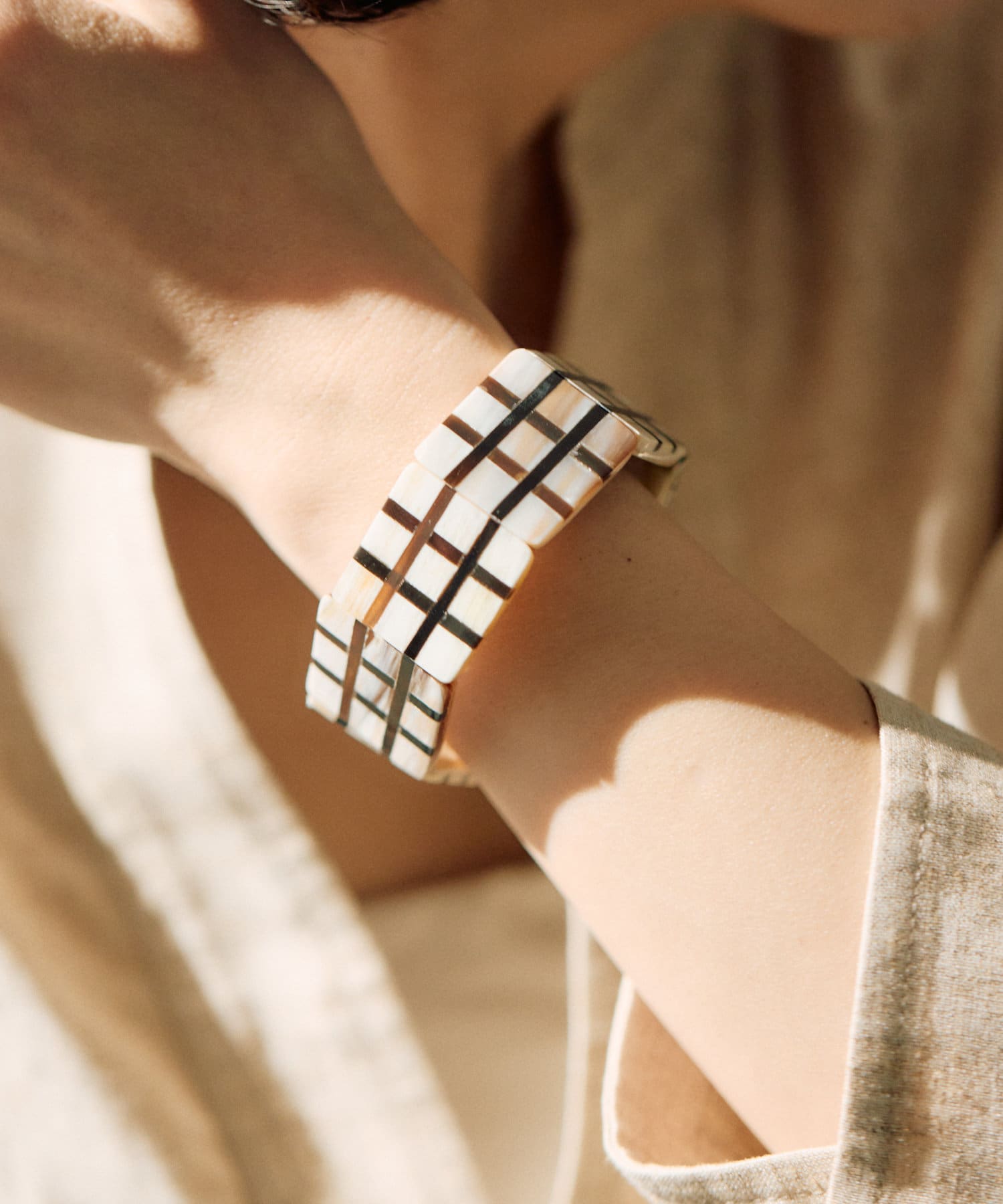 ear PAPILLONNER(イア パピヨネ) 水牛角格子柄ブレスレット
