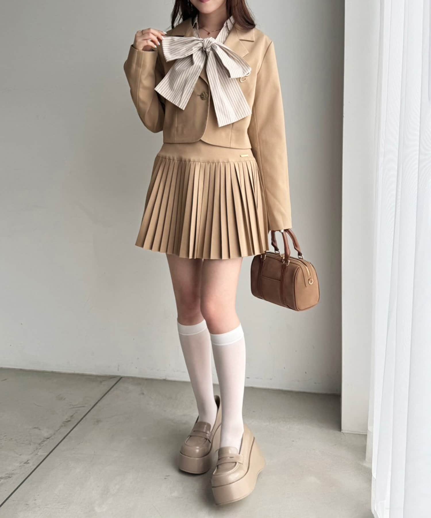 one after another NICE CLAUP(ワンアフターアナザー ナイスクラップ) プレート付きプリーツミニスカート