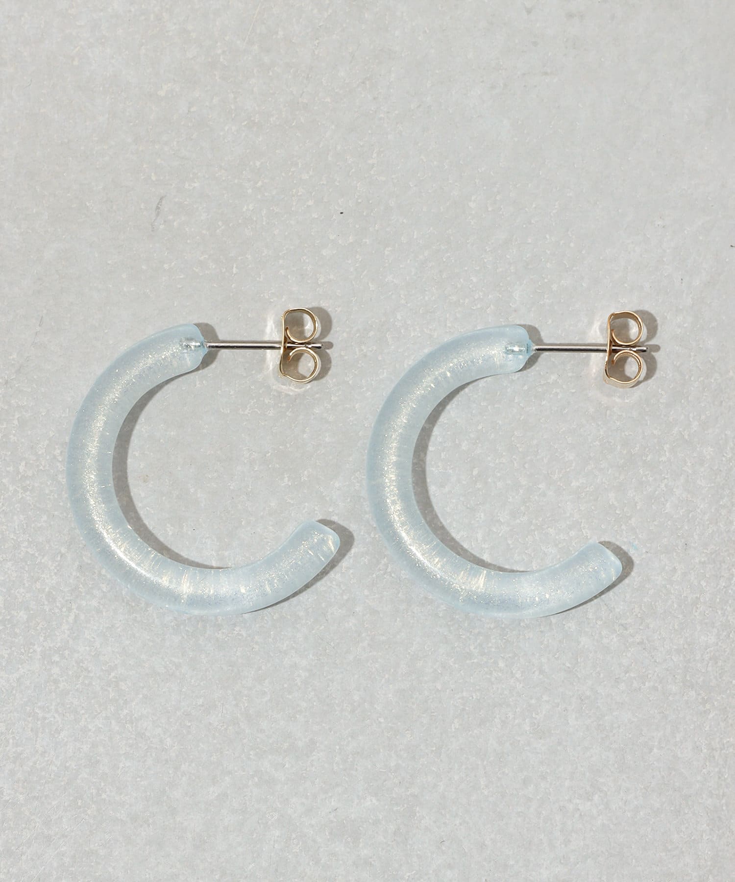 3COINS(スリーコインズ) クリアラメカーブピアス