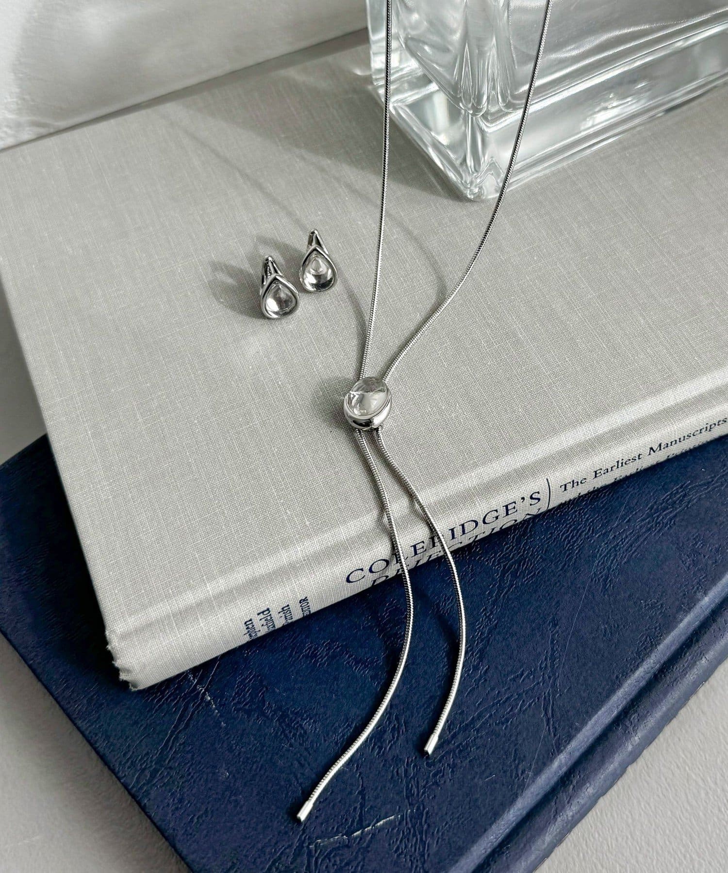 FREDY & GLOSTER(フレディ アンド グロスター) クリアストーンスライドボータイネックレス