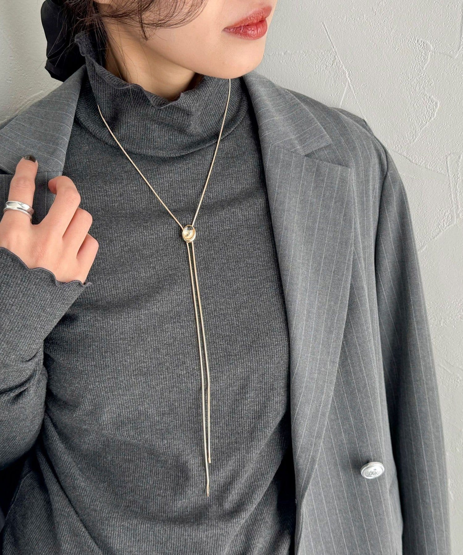 FREDY & GLOSTER(フレディ アンド グロスター) クリアストーンスライドボータイネックレス