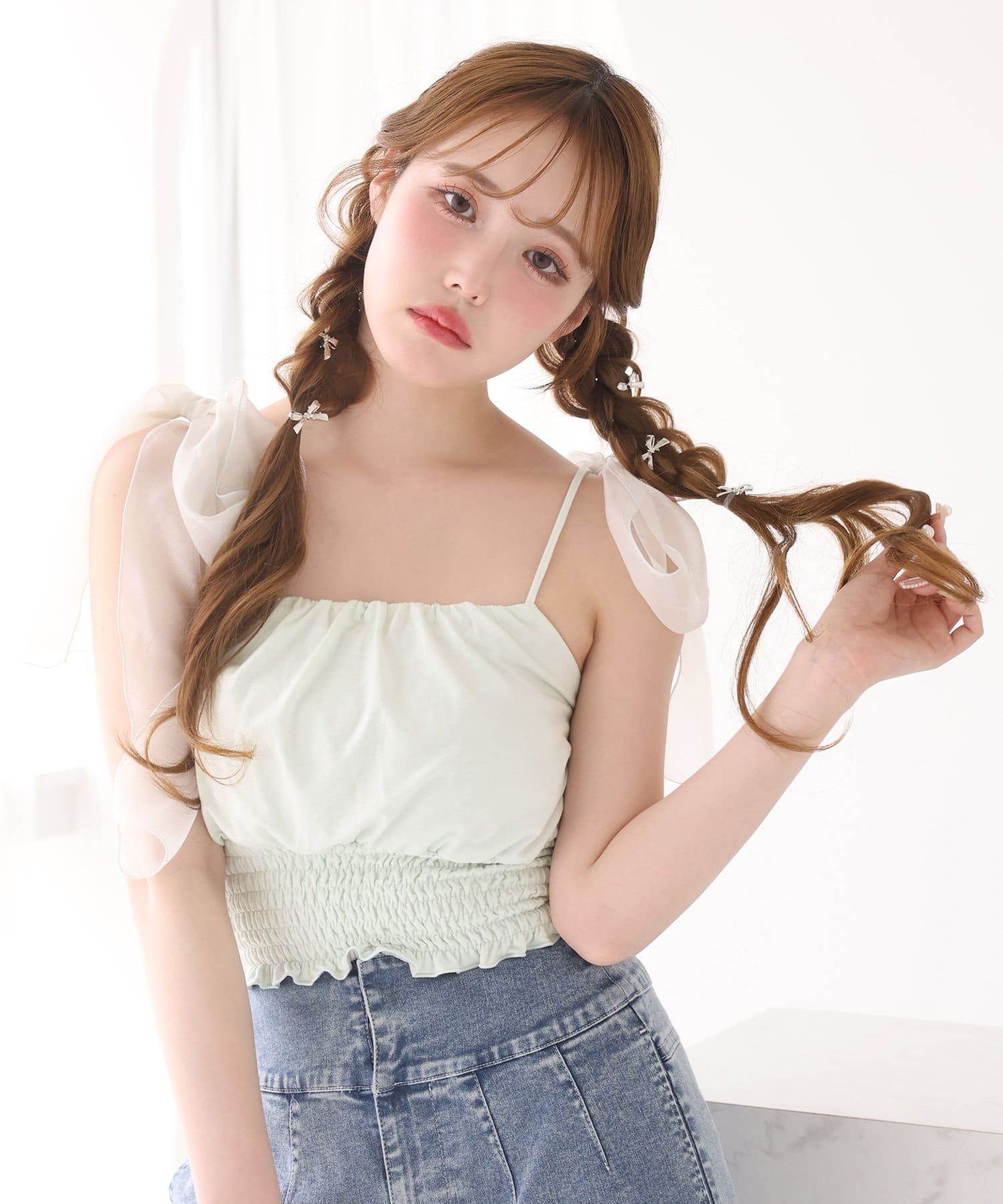 ~NICECLAUP 2025 Early　Summer Collection~大きめ肩リボンがポイントのキャミソールウエストはシャーリングデザインになっているので、スタイルアップ効果も◎コンパクトな