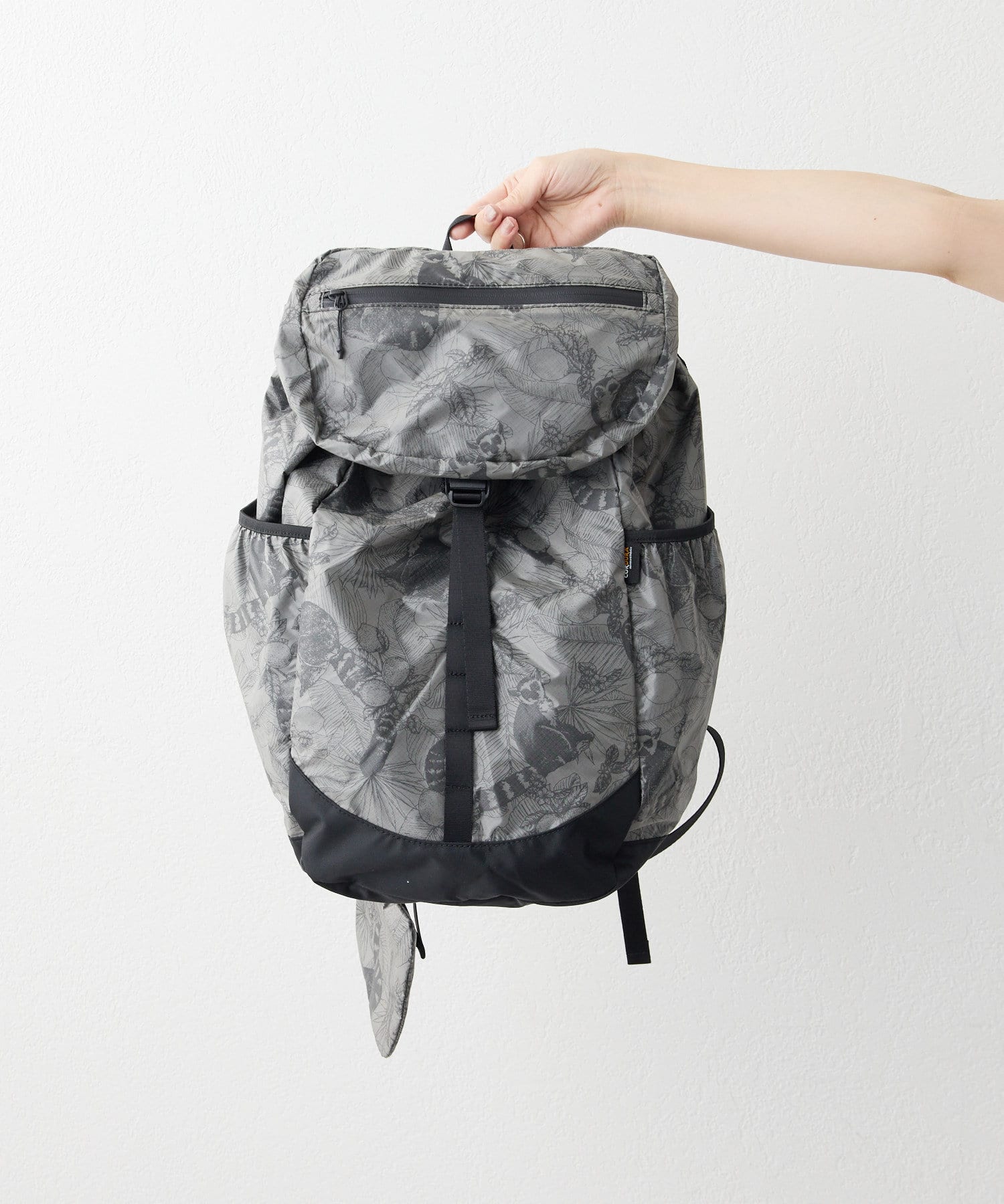 は美品】ear PAPILLONNER 樹脂パーツリュック ヘビ柄