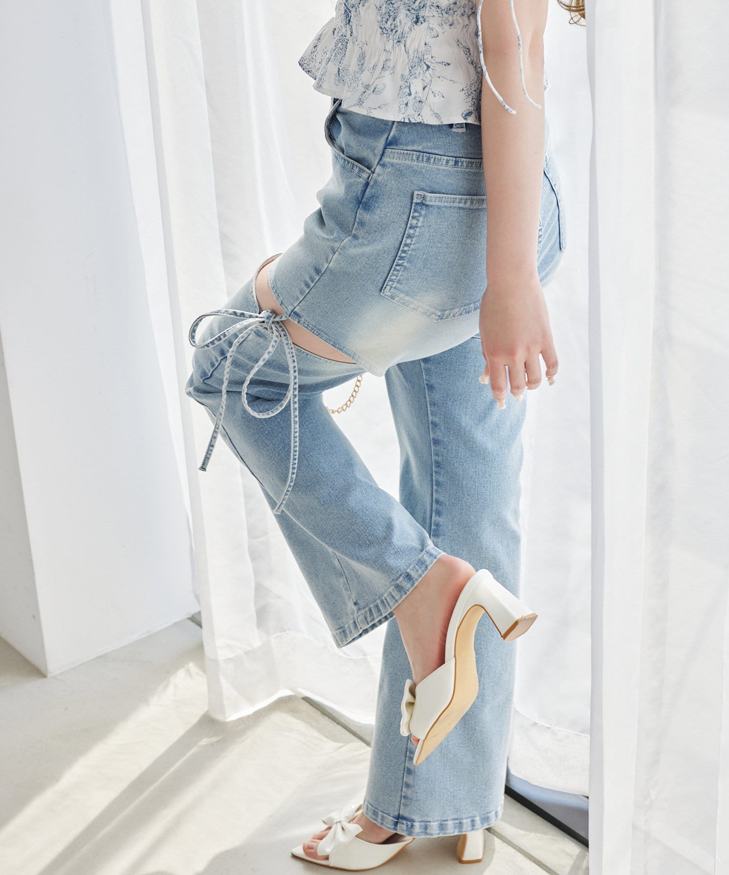 ※サイズ表記について1＝Sサイズ2＝Mサイズ~NICECLAUP 2025SS Summer Collection~サイドオープンデザインで抜け感をプラスしつつ、リボンディテールでガーリーなアクセント