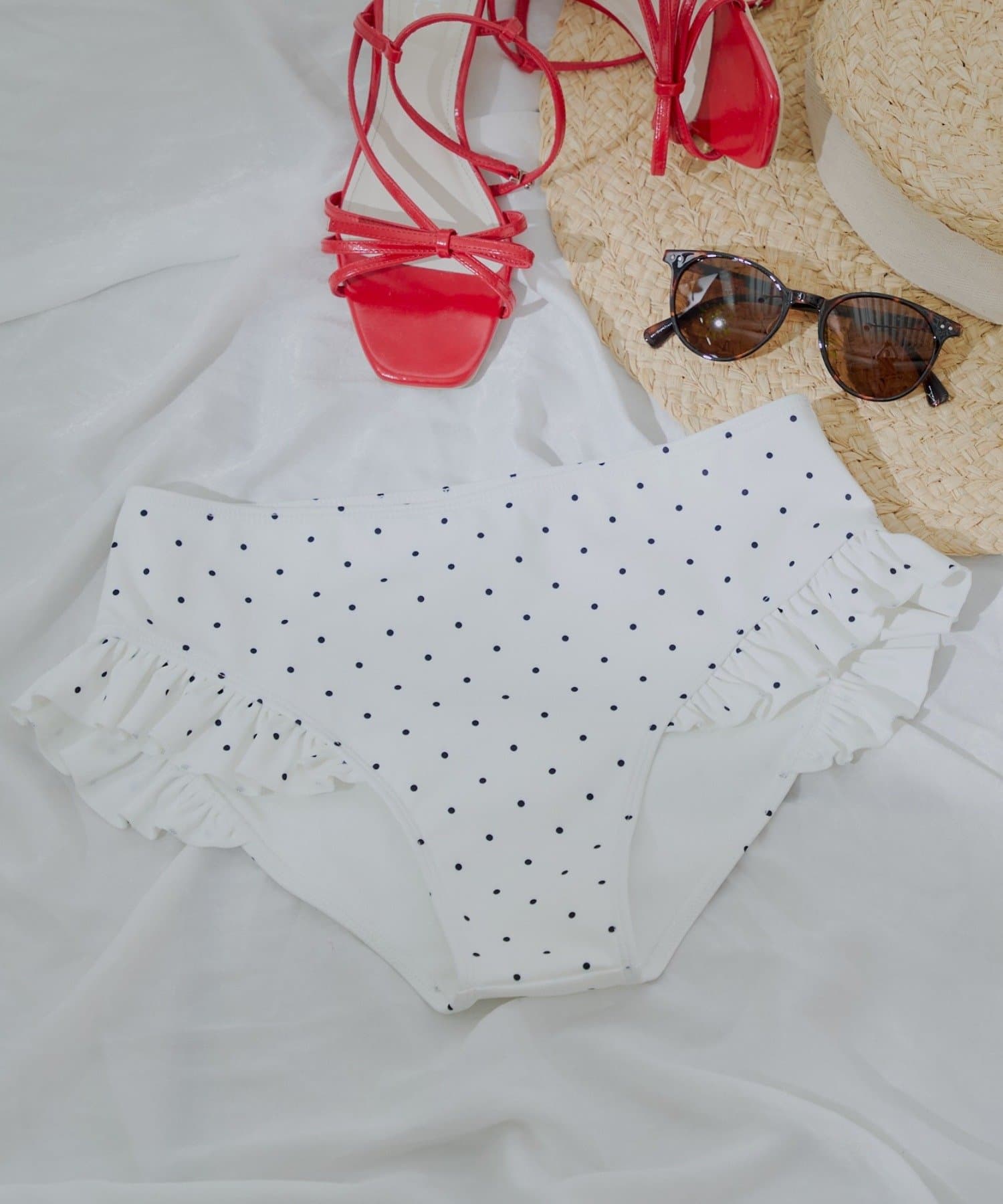 Chico SWIM WEAR COLLECTION 2025裾のフリルがキュートなショーツが登場！▶商品ポイント・伸縮性があり着心地が良く動きやすさ抜群です◎・裾のフリルがワンポイントアクセントに！