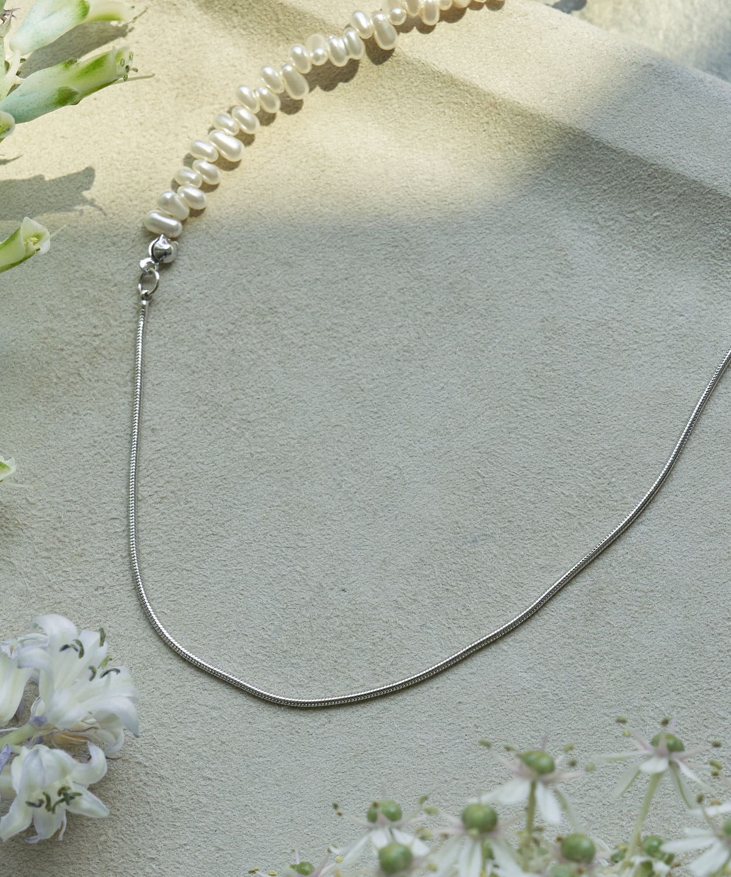 Jena　espace merveilleux(ジェナ　エスパスメルヴェイユ) パールミックススライドネックレス