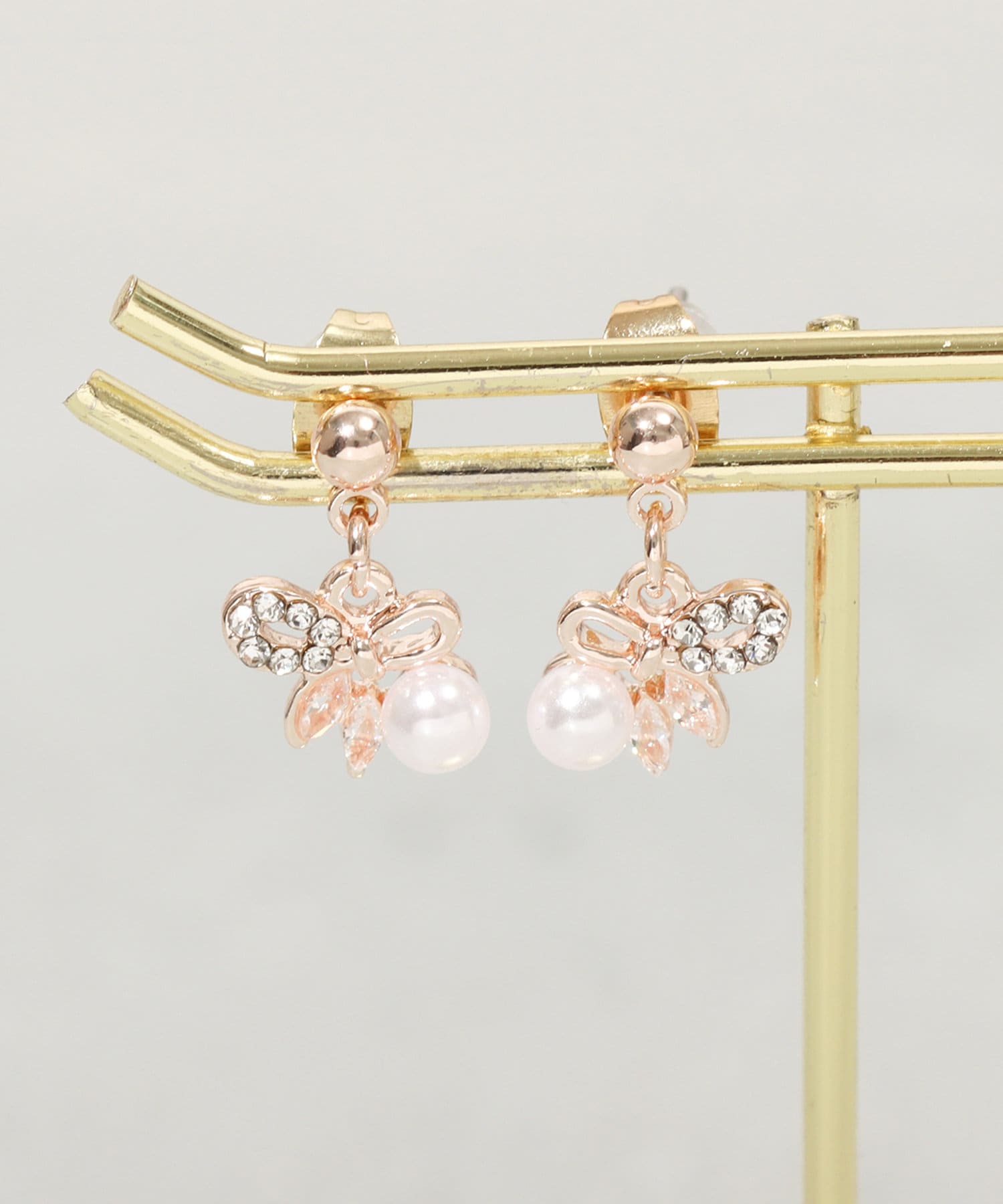 3COINS(スリーコインズ) パール付リボンピアス