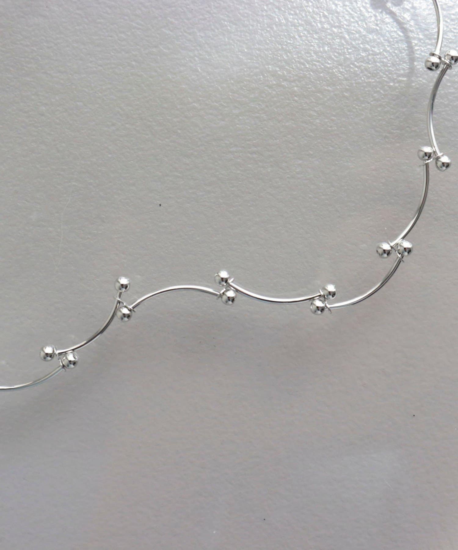 FREDY & GLOSTER(フレディ アンド グロスター) ツブツブカーブネックレス