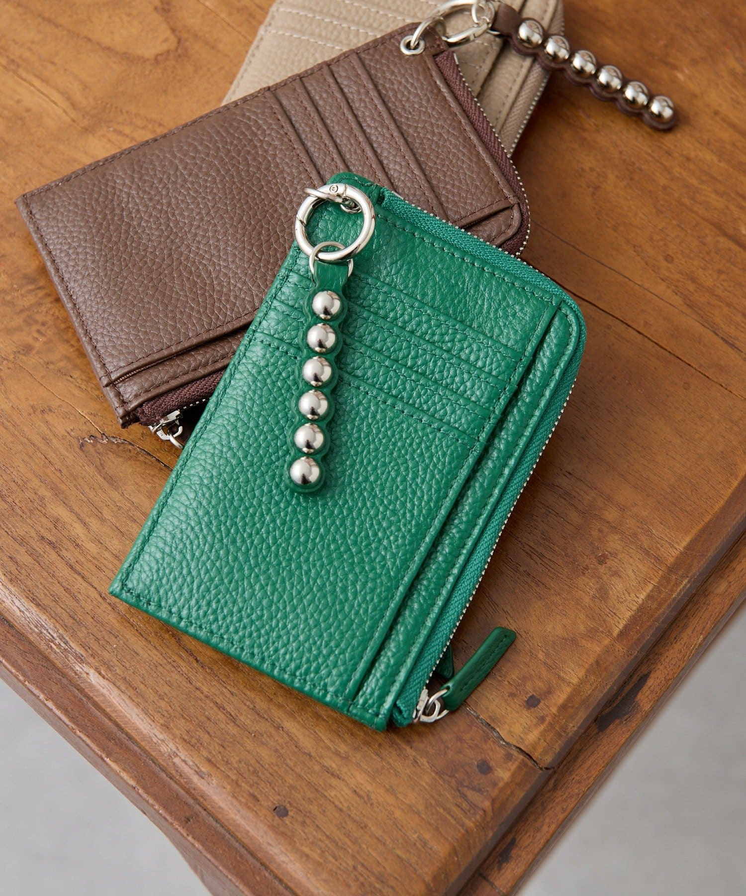 ear PAPILLONNER(イア パピヨネ) 再予約受付中！【インフルエンサーほし企画】本革スタッズフラグメントケース