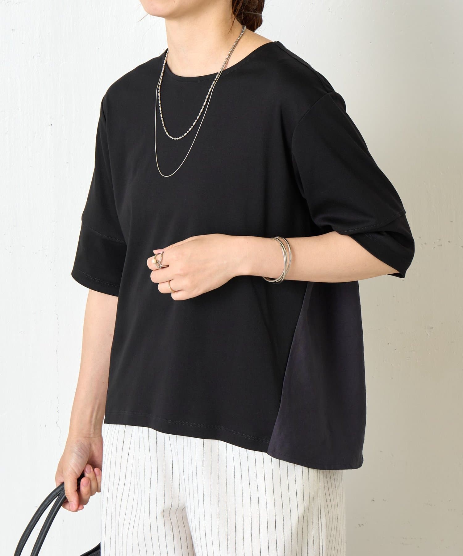 Jena　espace merveilleux(ジェナ　エスパスメルヴェイユ) 異素材バックフレアカットソー