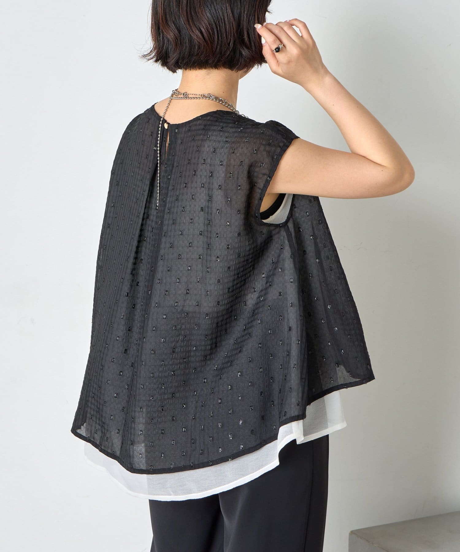 Jena　espace merveilleux(ジェナ　エスパスメルヴェイユ) 【1枚で旬なスタイリングに◎】ラメチェックシフォンノースリブラウス