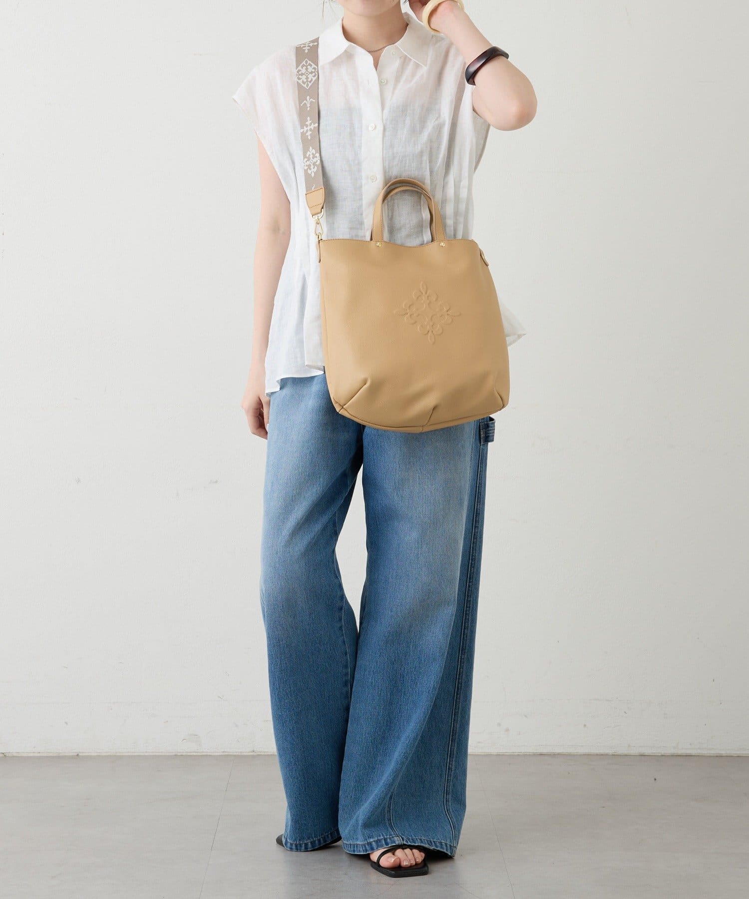 russet(ラシット) スリム2WAYトートバッグ <エンボスモノグラム>