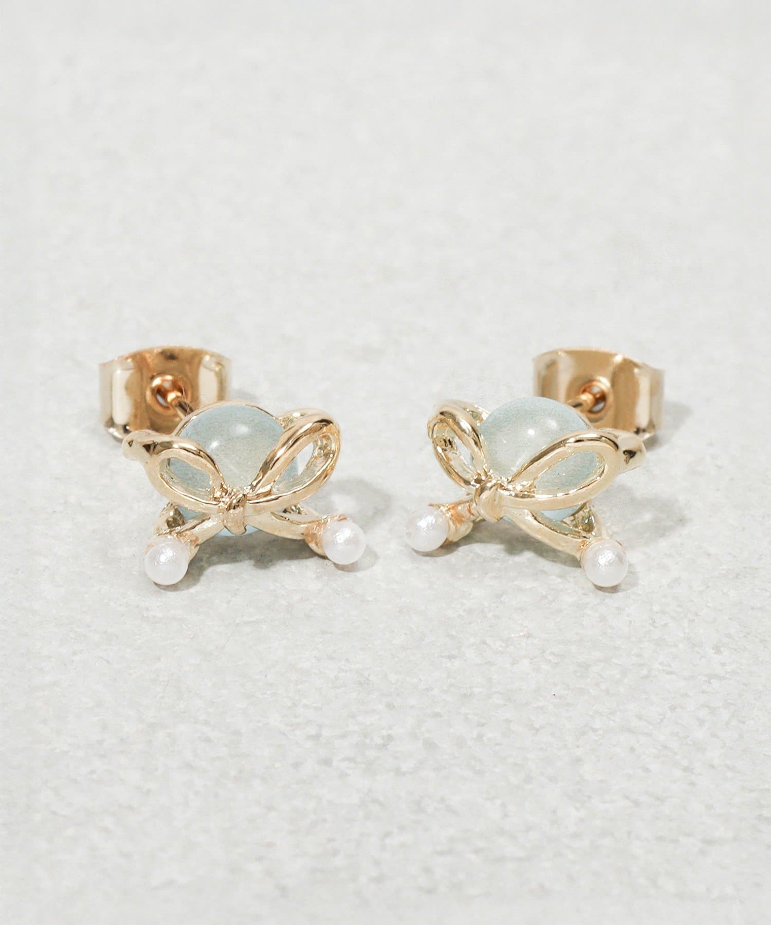 3COINS(スリーコインズ) クリアカラーメタルリボンピアス
