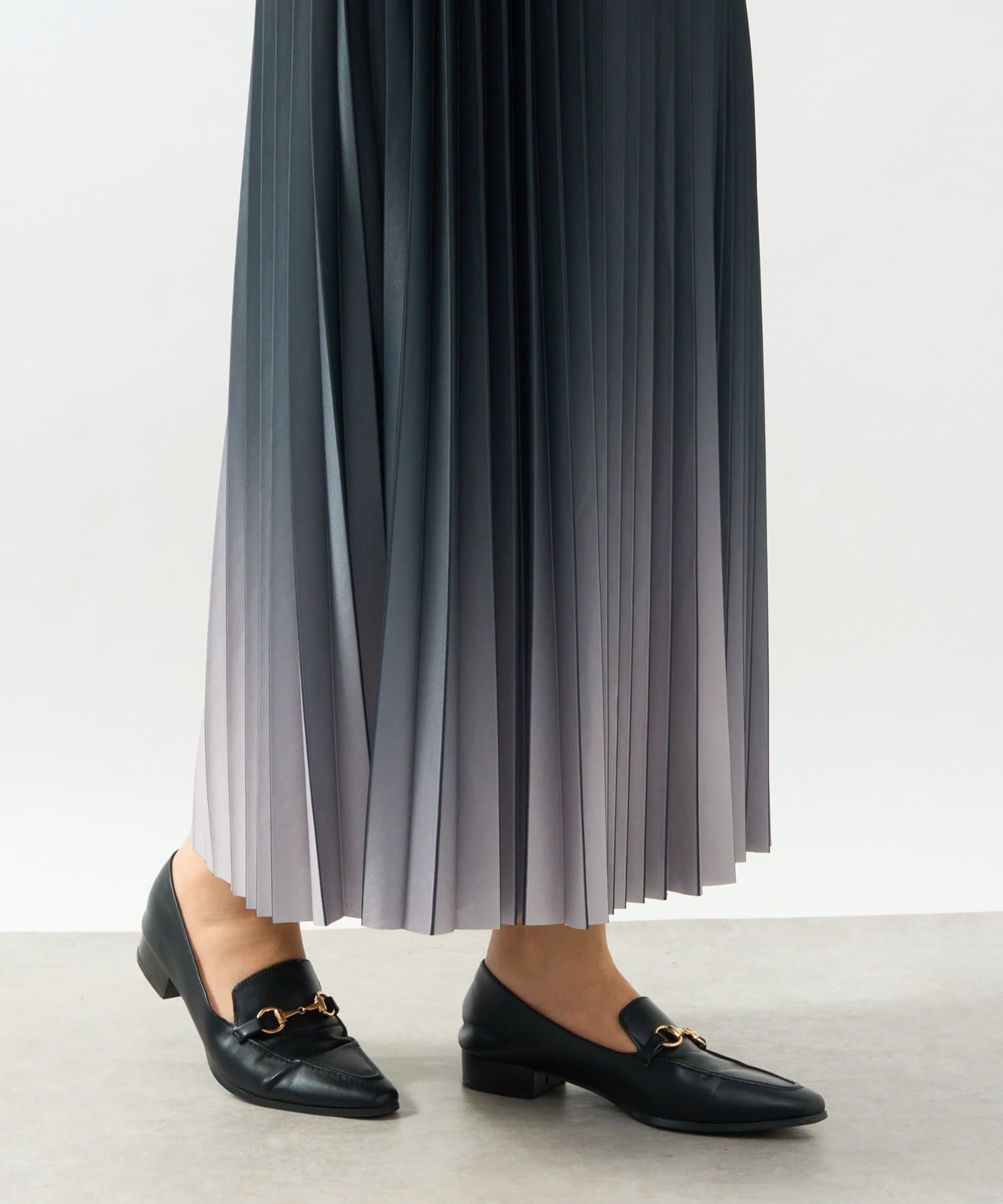 un dix cors(アンディコール) 《オンオフ兼用・ウエスト総ゴム》グラデーションニットプリーツスカート