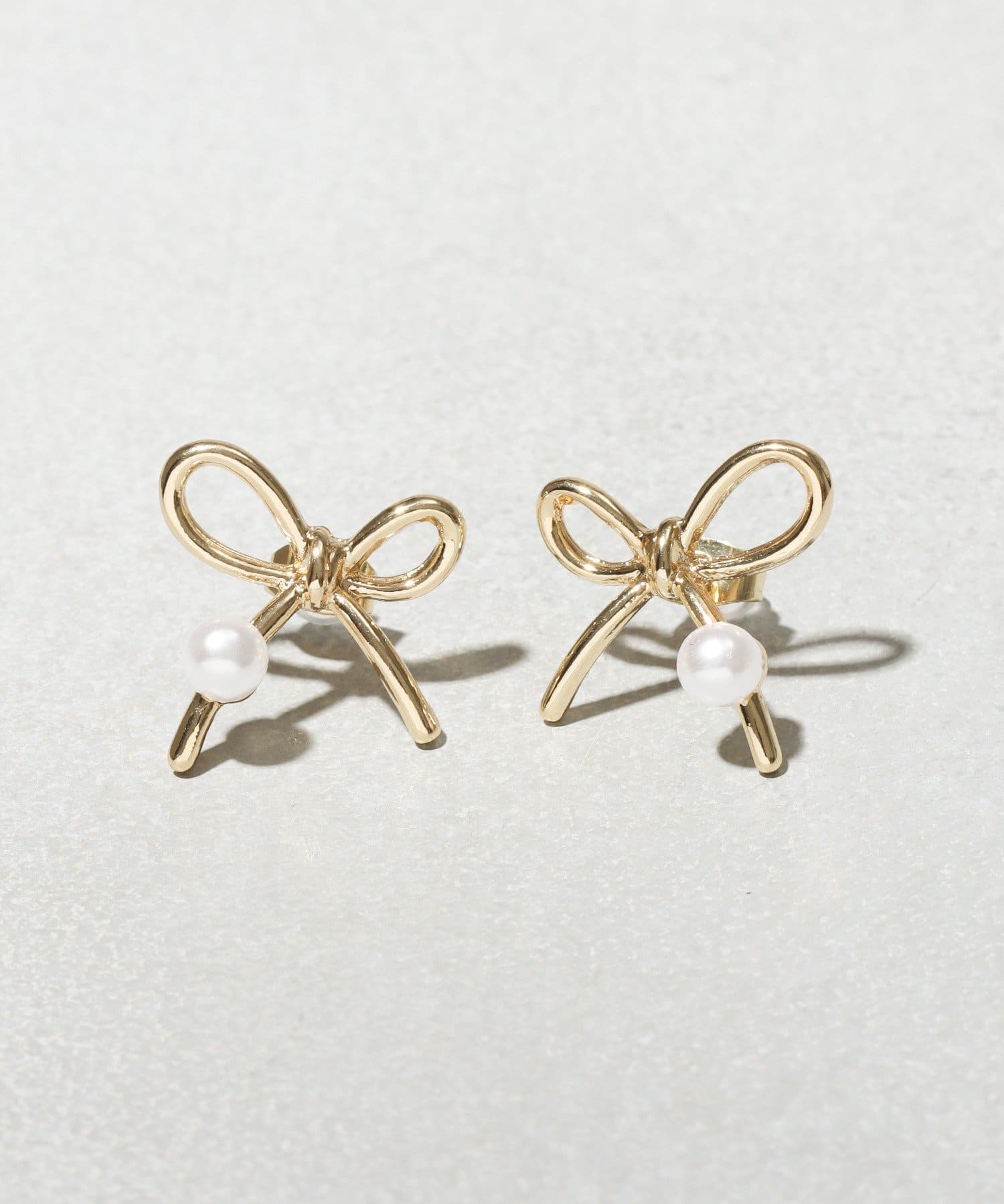 3COINS(スリーコインズ) リボンパールピアス