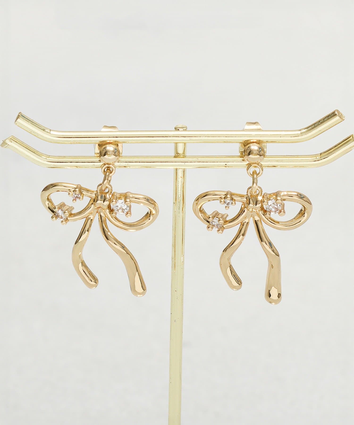 3COINS(スリーコインズ) ガラスリボンピアス